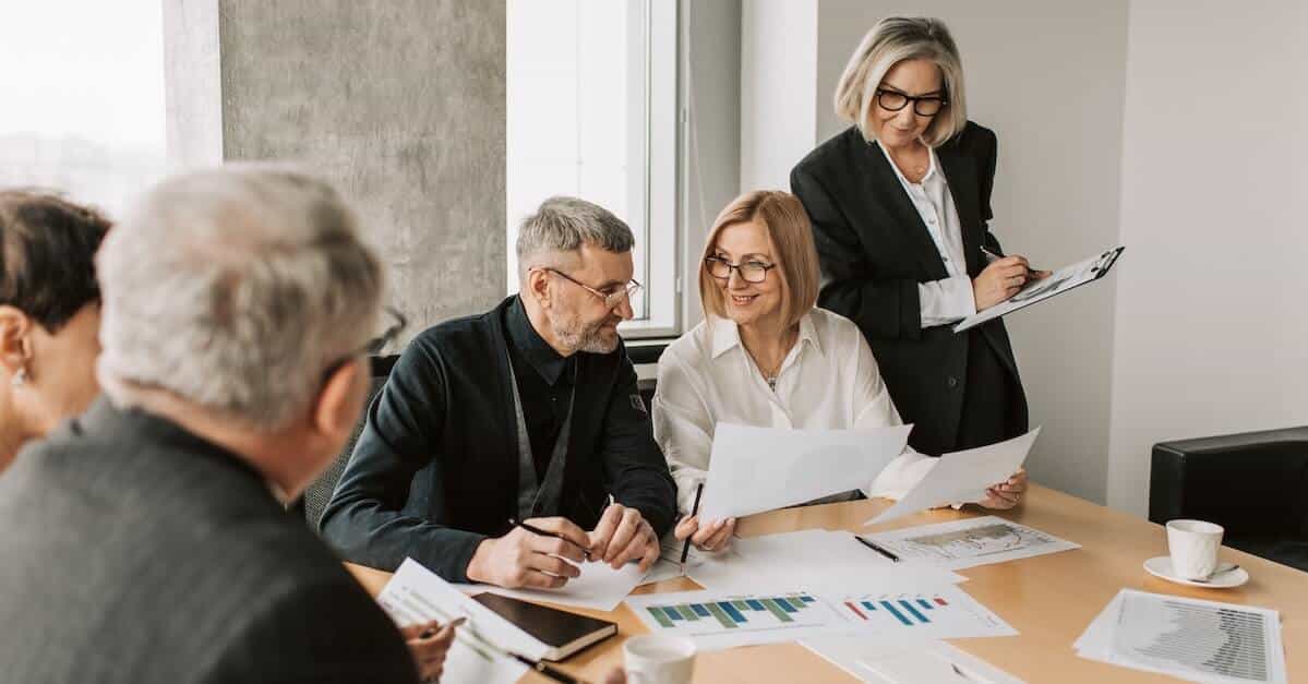 Group of people meeting in an offer